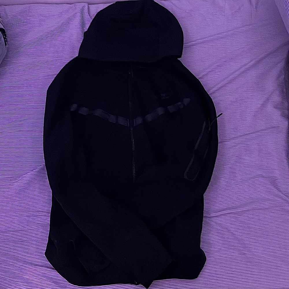 Used black Nike tech black size large